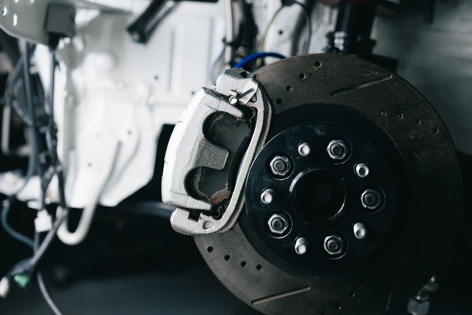 Brake caliper and disc in a workshop