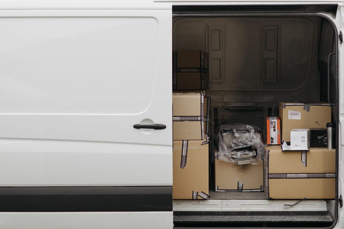 Delivery van loaded with boxed parts